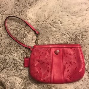 Hot pink coach wristlet